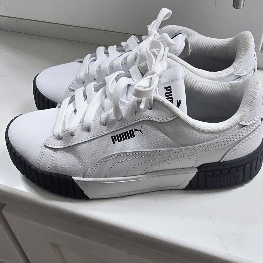 Puma White Sneakers with Black Soles